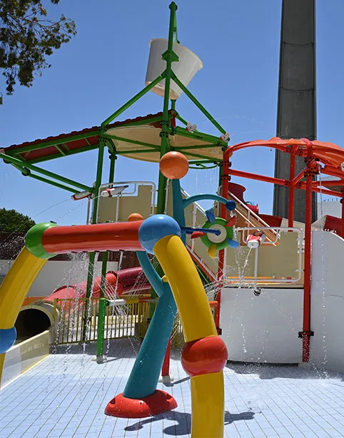 Colourful splash park play equipment